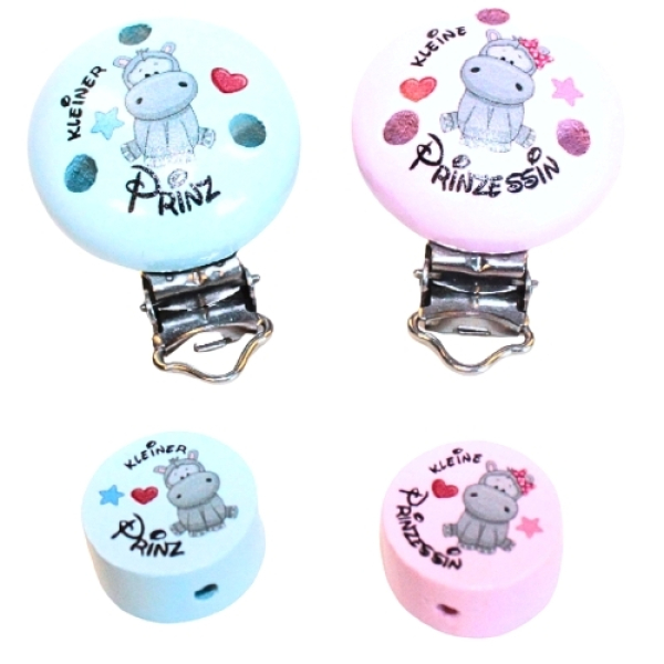 Runde Holzclips in Blau und Rosa mit Nilpferd-Motiv und Aufschrift „Kleiner Prinz“ bzw. „Kleine Prinzessin“. Geeignet für Schnullerketten und Kinderaccessoires.